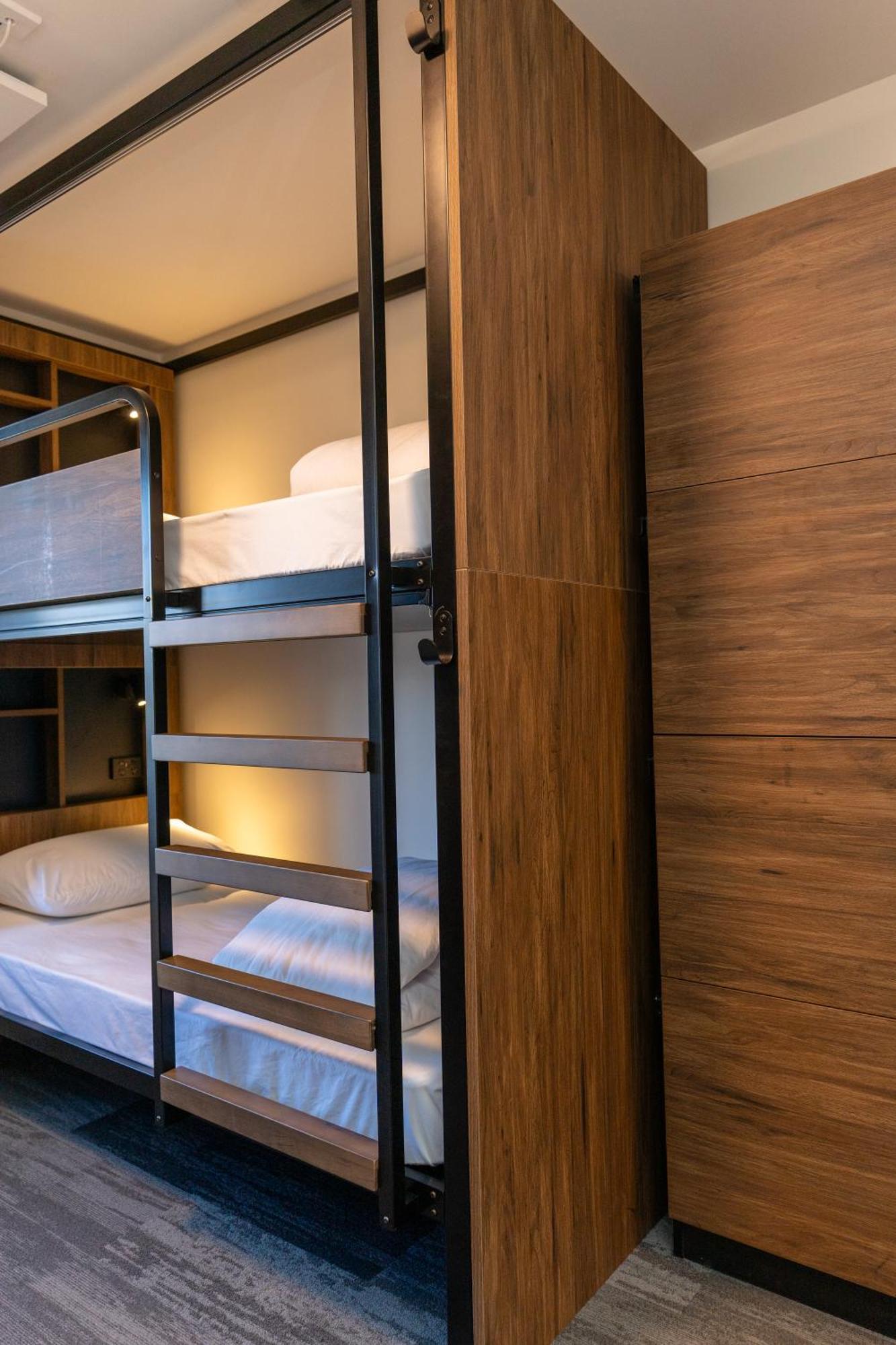 Haka House Rotorua Hostel Ngoại thất bức ảnh A bunk bed in a capsule hotel
